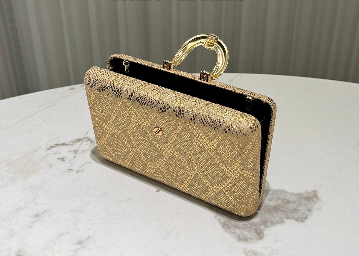 Party gold textured women’s clutch