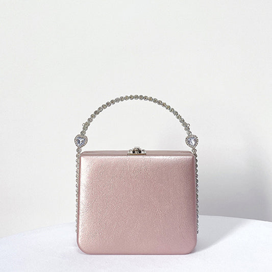 Hand held rhinestones embellished women’s bag