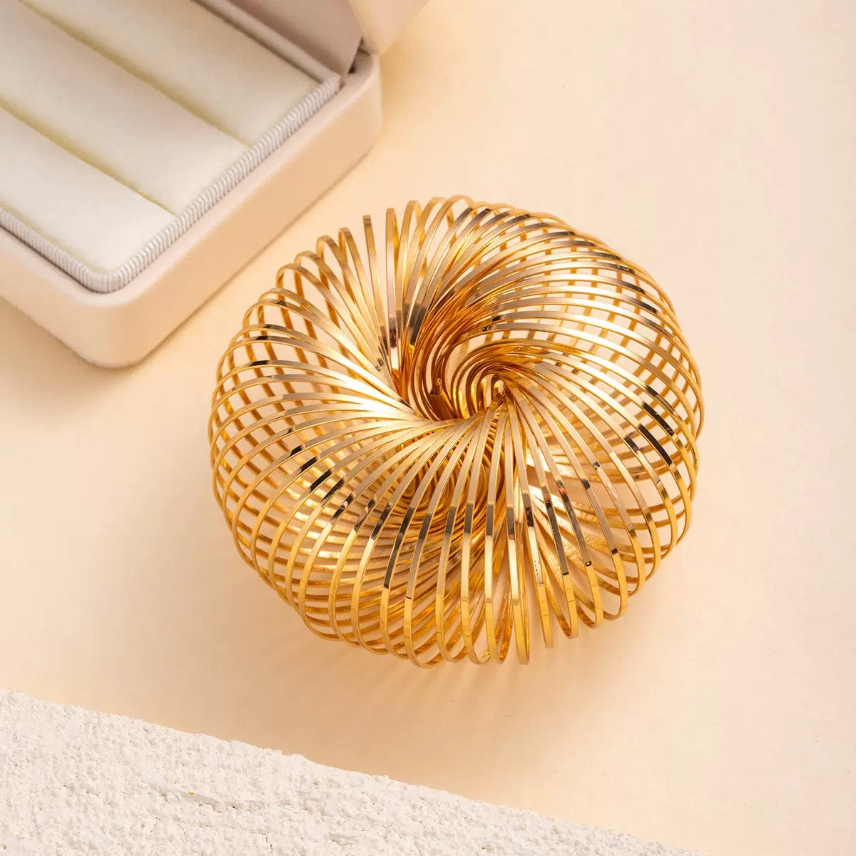 Spiral gold bracelet
