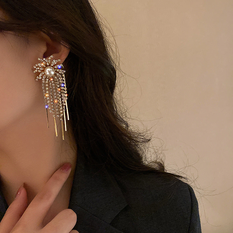 Sun shaped dropped earrings
