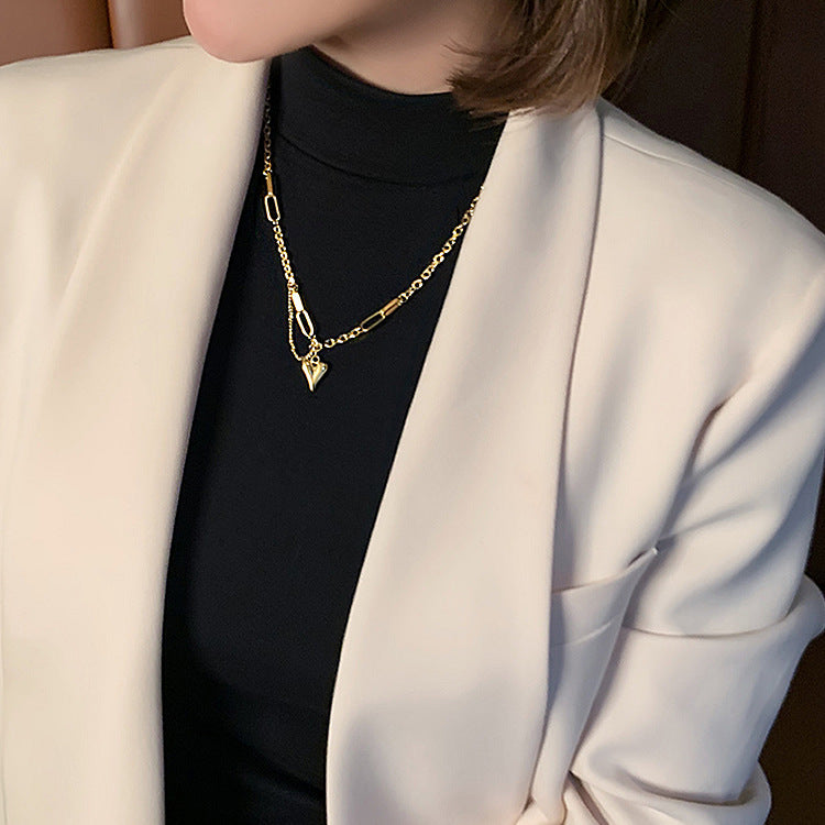 Gold heart pendant necklace