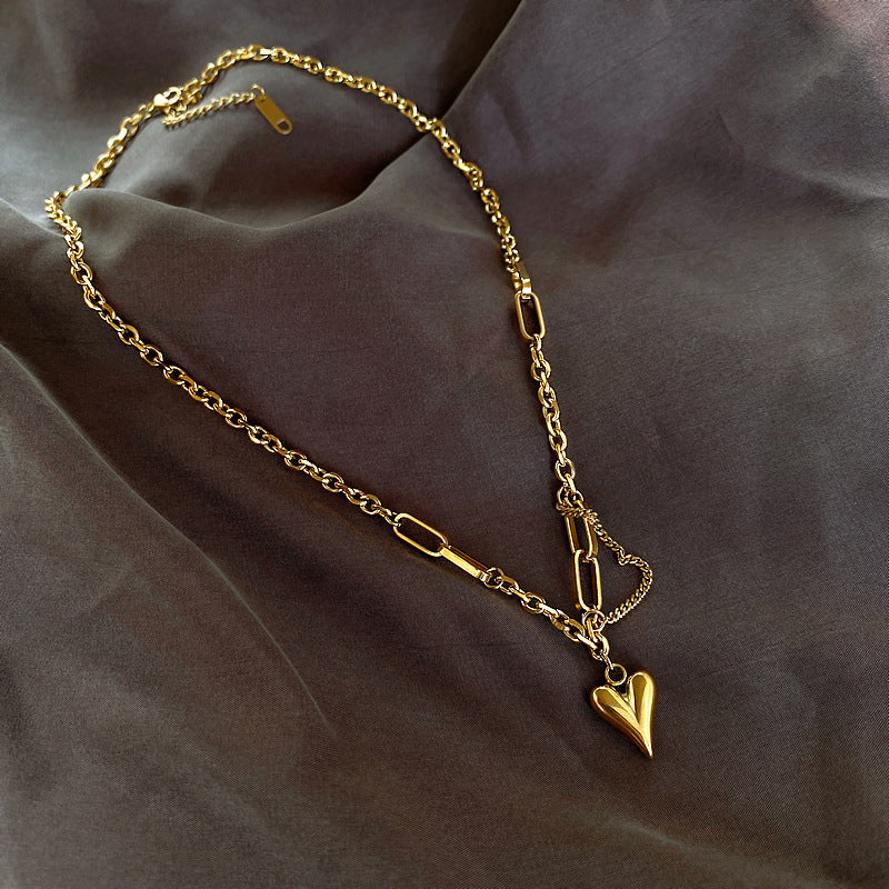Gold heart pendant necklace