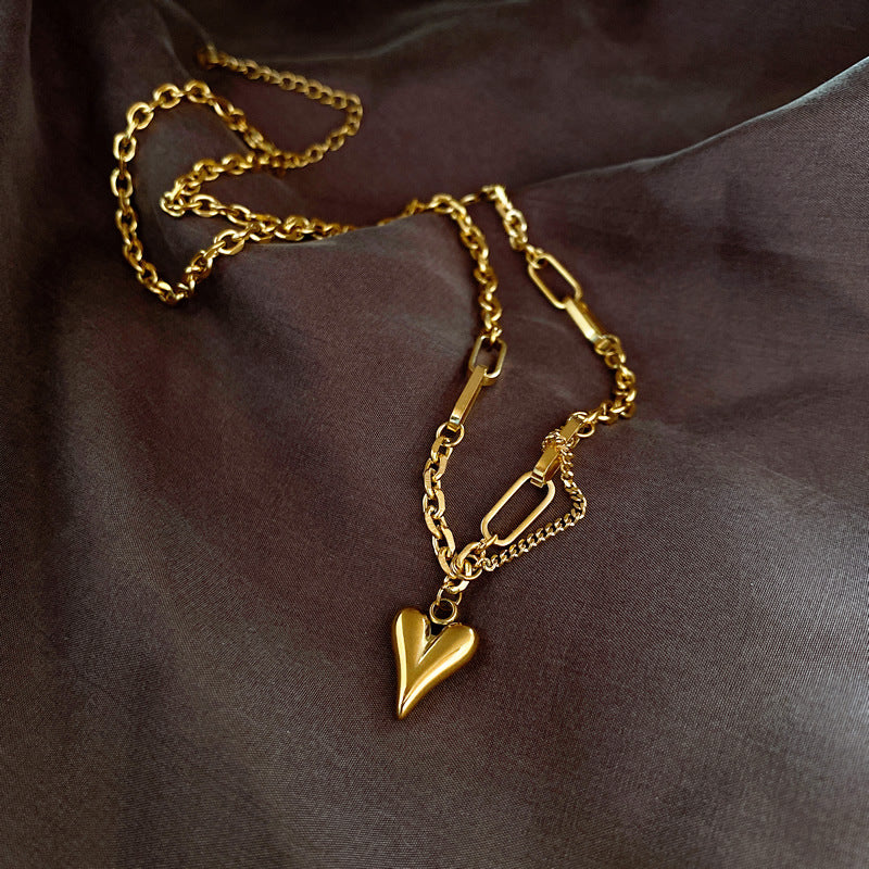 Gold heart pendant necklace