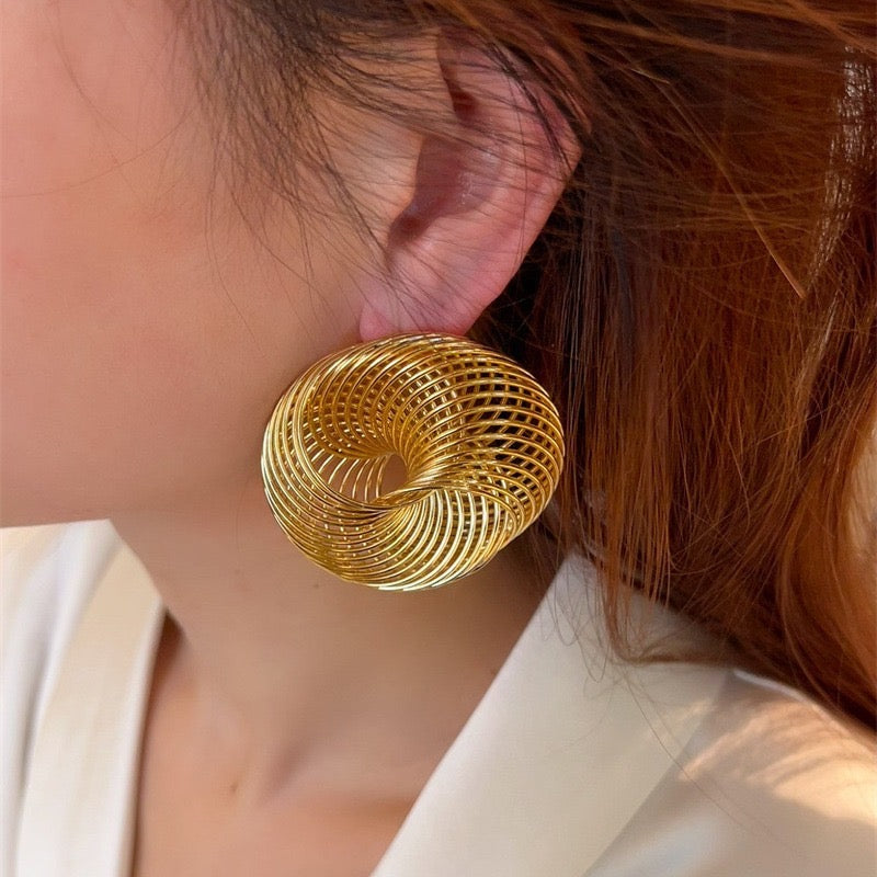 Exaggerated gold spiral mesh earrings