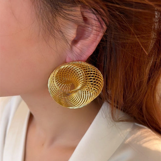 Exaggerated gold spiral mesh earrings