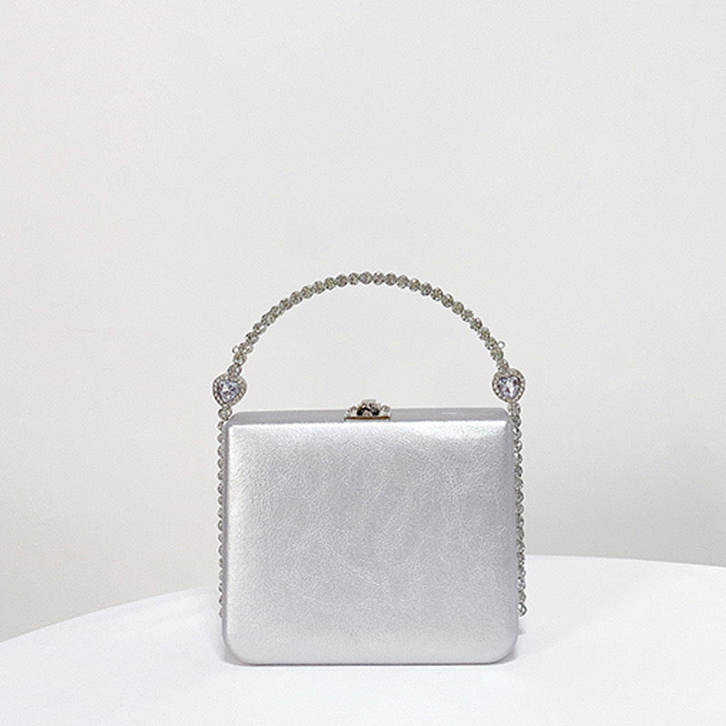 Hand held rhinestones embellished women’s bag