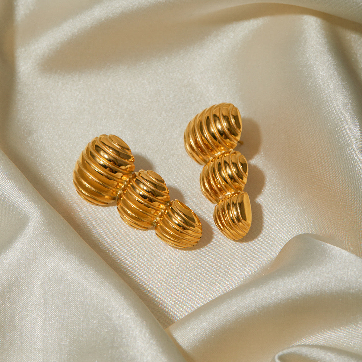 Peanut shaped gold earrings