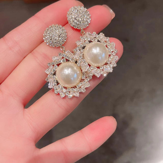 Zircon and pearl dangle earrings