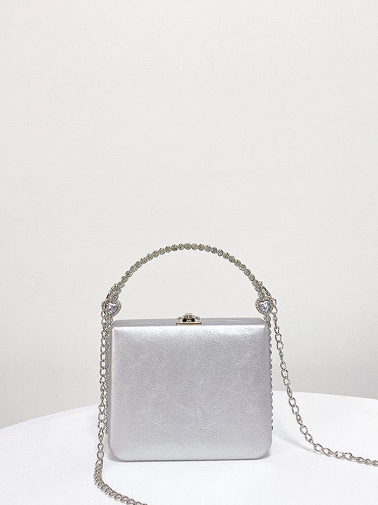 Hand held rhinestones embellished women’s bag