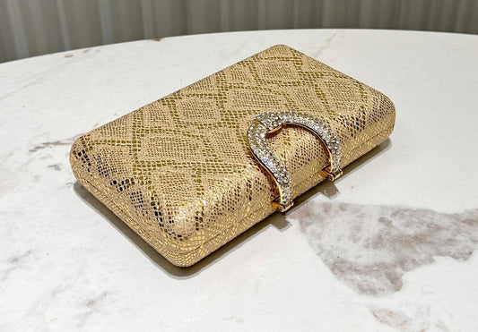 Party gold textured women’s clutch