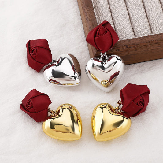 Red knotted heart shape earrings