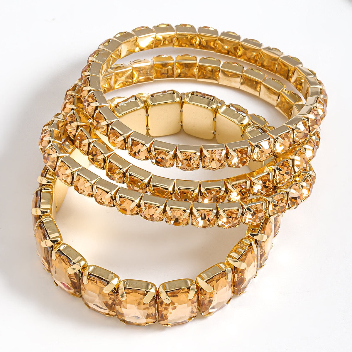 Gold colored stacked stone bracelets
