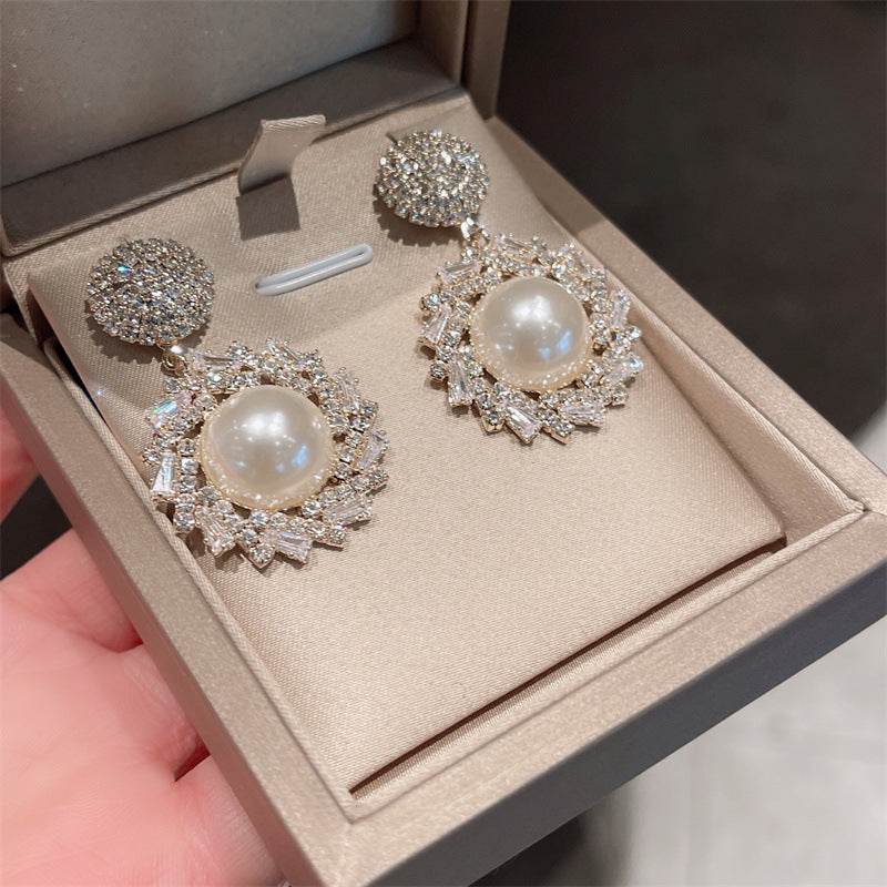 Zircon and pearl dangle earrings