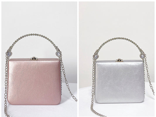 Hand held rhinestones embellished women’s bag