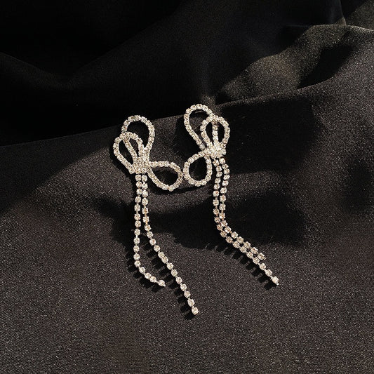Double bow thin silver earrings