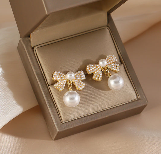 Delecate pearl bow dainty earrings