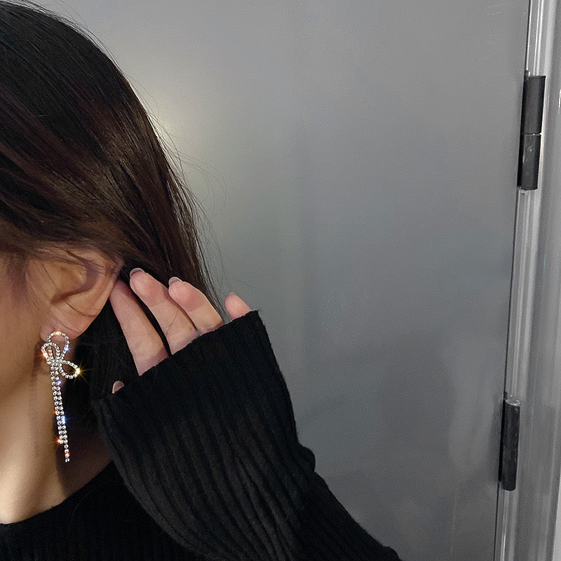 Double bow thin silver earrings