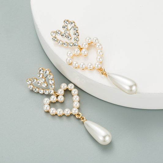 Love shaped pearl drop earrings