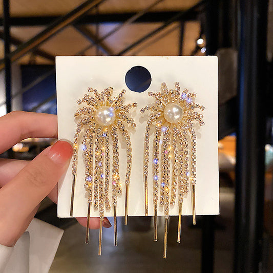 Sun shaped dropped earrings