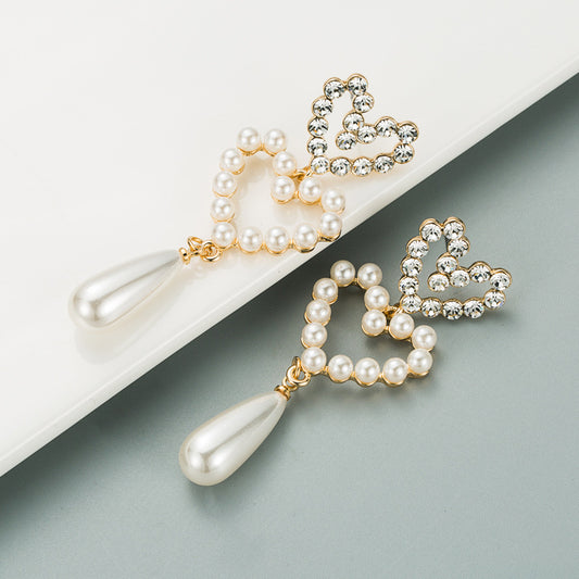 Love shaped pearl drop earrings