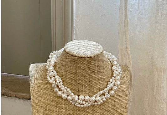Entwine four tier pearl necklace